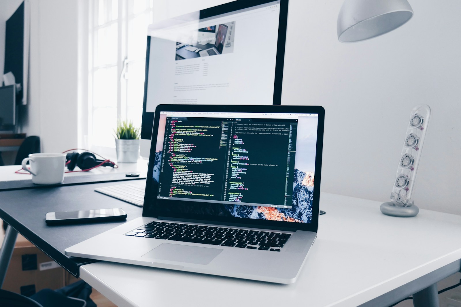 Editor researching generative AI and large language model developments on a laptop